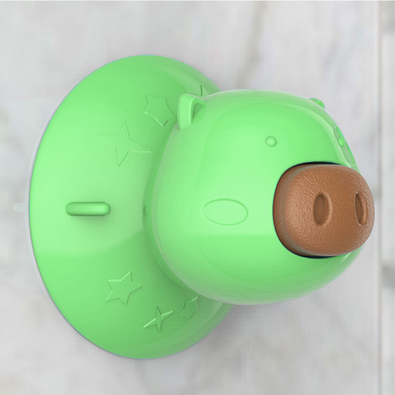 Interactive dog bathing toy attached to a bathroom wall with a dog enjoying its treat, promoting a fun and relaxed bath experience.