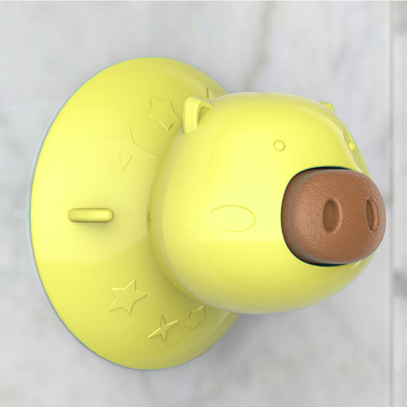 Interactive dog bathing toy attached to a bathroom wall with a dog enjoying its treat, promoting a fun and relaxed bath experience.